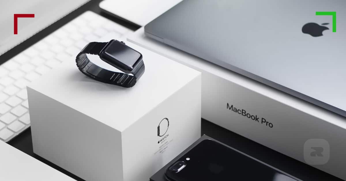 Apple Watch on white box and Macbook on the side. ECN Broker - Cryptos & Forex | OspreyFx