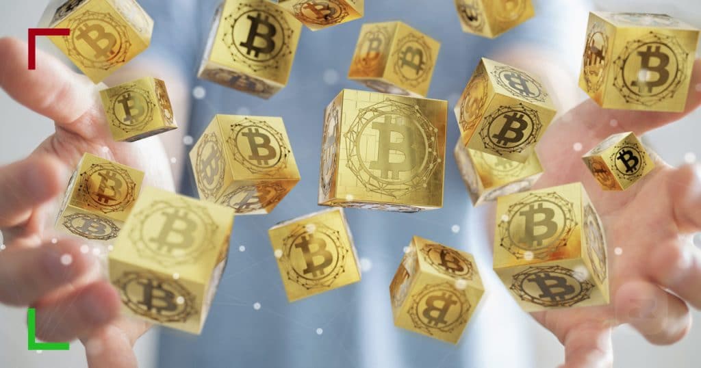 Several golden cubes with bitcoin symbols. 1:500 Leverage on Cryptos & Forex | OspreyFx
